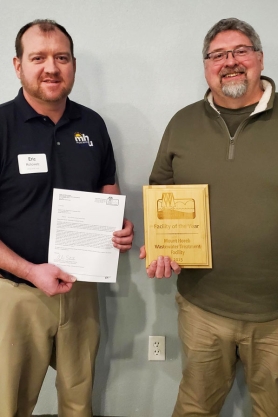 Eric Rohowetz and John Klein pose with their 2023 Wastewater Award for Mount Horeb Wastewater Treatment Facility of the year.